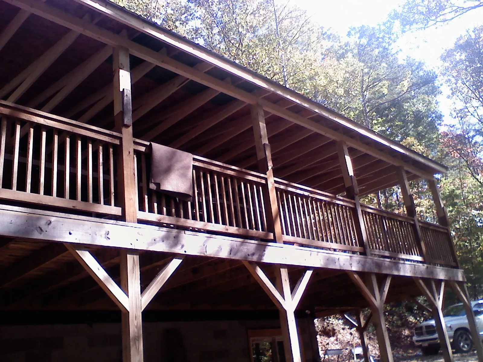 Timber framing under a new elevated porch and deck — Roof Leak Repair in Austinburg by Roofing Brothers